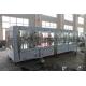 Gravity Plastic Bottle Filling Machine With Shrink Wrapping Equipment  4 in 1