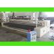 NON-WOVEN ROLL AND CUT MACHINERY