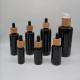 10ml 15ml 30ml 50ml 100ml 200ml Black round shoulder essential oil  empty cosmetic glass bottles with bamboo dropper