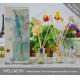 Exquisite Colorful Wooden Reed Diffuser With Customized Clear Bottle , Silver Lid And Wood Flower