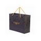 UV Bronzing Eco Paper Bags , Black Cardboard Paper Bag With Three Strands Ropes