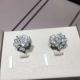 Piaget brand jewelry 18kt  Piaget Rose earrings in 18K white gold set with 72 brilliant-cut diamonds (approx. 0.45 ct).