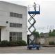 Hydraulic Mobile Scissor Lift 6 Meters Platform Height 1 Ton Loading Capacity For Exhibition Hall