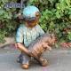 Customized garden decoration, life-size bronze statue of a young man playing with his dog