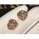 Piaget brand jewelry 18kt  Rose earrings in 18K rose gold set with 2 brilliant-cut diamonds (approx. 0.01 ct).