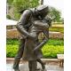 Bronze man woman statues kissing sculptures