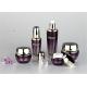 Transparent And Purple Empty Makeup Bottles With A Metallic Color