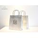 SOS Style Kraft Paper Carry Bags , White Paper Bags With Handles Strong Twisted