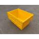 Yellow Plastic Storage Bins Attached Lids Stacked For Transportation