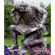 abstract man reading bronze garden statue