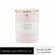 Natural soy wax candle in pink color round bottle with golden top lid