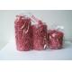 Red & Pearl scented pillar candle wrapped by  lots of rose packed into gift bag