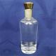 Free Sample 500 ml 750 ml Glass Round Liquor Bottle with Cork Sealing Type