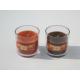 Orange & brown scented glass jar candle with printed label packed into gift box