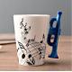 Creative two tone color glazed ceramic V Shaped Mug with musical instrument handle