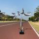 Decorative Stainless Steel Polished Ribbon Sculpture With Black Stone Base