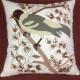 Embroidery cushion cover with bird design.