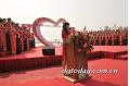 100 couples attend group wedding in Dongguan