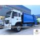 Sinotruk Homan 4x2 10000L RHD Garbage Compactor Truck