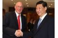 No change in currency policy, Xi tells Paulson