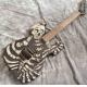 Skull Carving Body 6 Strings Electric Guitar in Matte Black Color