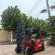 Small Electric Forklift for Food Beverage Shops Four Wheel Drive Handling Equipment