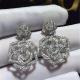 Piaget  full  diamonds of hollow  rose earring 18kt gold  with white gold or yellow gold
