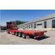 Truck Trailer Flatbed Semi Trailer With 30-60 Tons Loading Capacity And 1 Tool Box Big Chamber