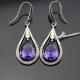 White Gold Plated 925 Silver 7x9mm Oval Amethyst Cubic Zirconia Earrings (PSJ04585)